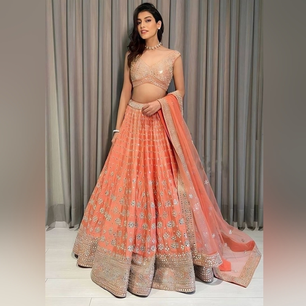 Delightful Orange Sequins, Zari With Embroidered Devsena Silk Lehenga Choli